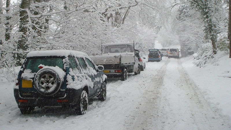 Cars Lined Up On A Snowy Road - Car Care Neglected During Winter Blog at CCM