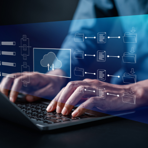 Person using laptop checking files.